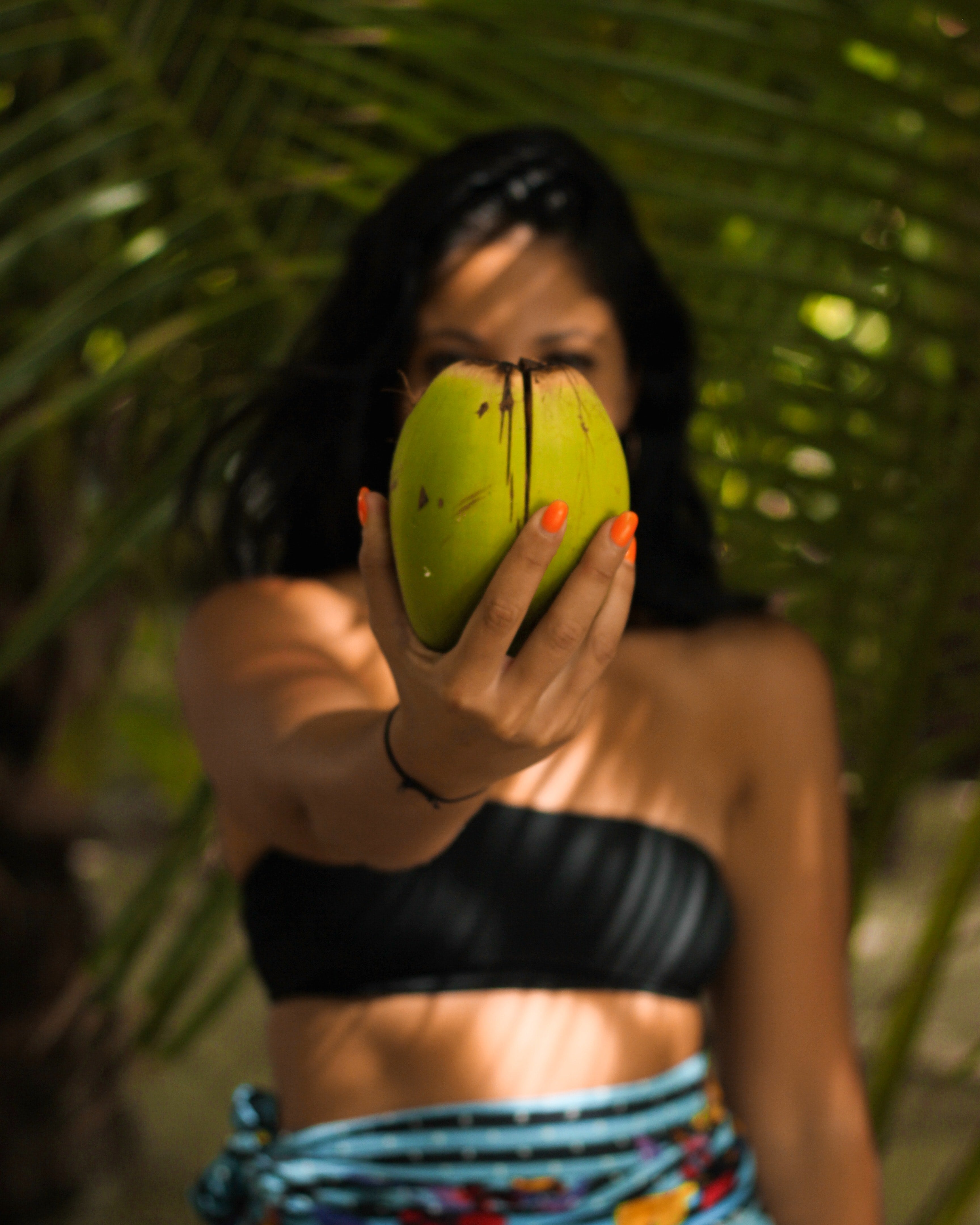 Woman Holding Coconut